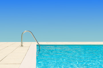 swimming pool water on blue sky background