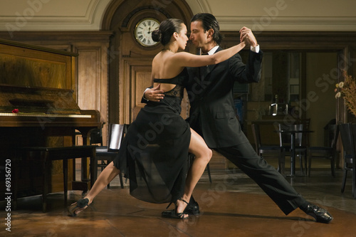 фотографія  Young couple dancing