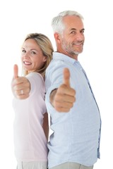Aufkleber - Smiling couple showing thumbs up together