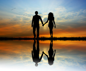 Wall Mural - lovers silhouette at sunset