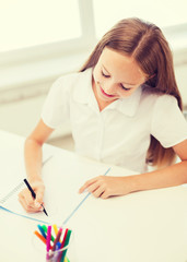 Poster - little student girl drawing at school