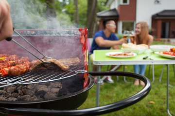 Canvas Print - grilling meat on a barbecue