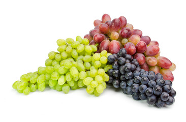 Wall Mural - Ripe green and purple grapes isolated on white