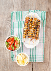 Wall Mural - Mussel skewers with fresh salad