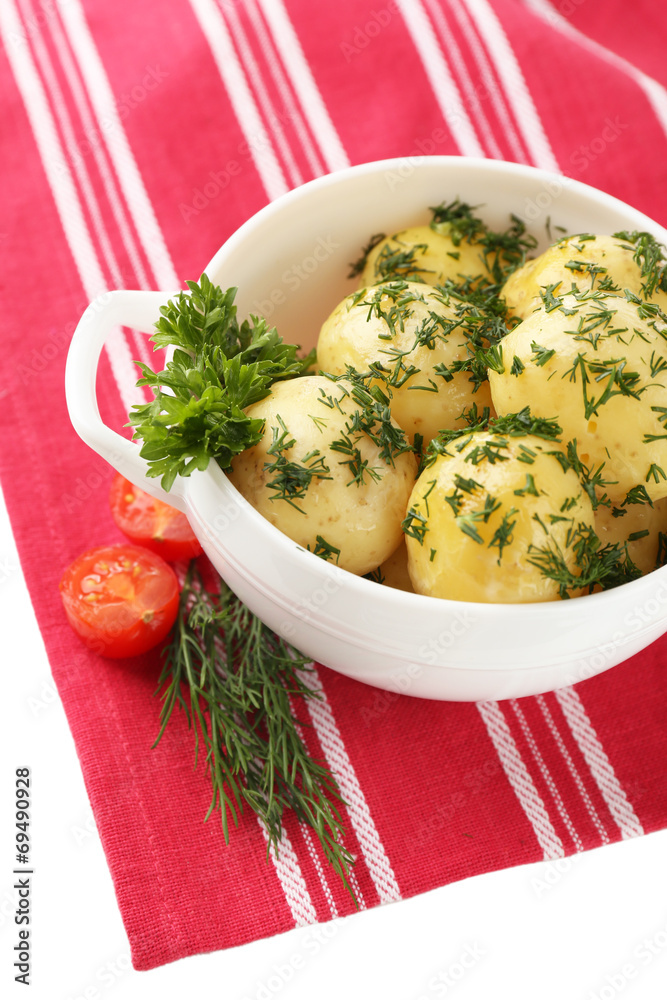 Young boiled potatoes in bowl, close up
