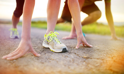 Couple running feet closeup