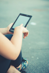 close up of woman hand using technological tablet device