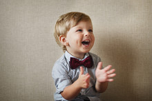 Beautiful Little Boy Laughing And Clapping