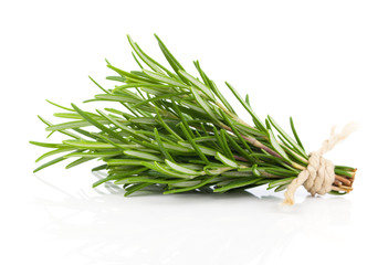 Wall Mural - tied fresh rosemary on a white background