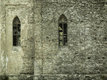 Old Stone Castle Wall With Broken Vertical Windows