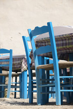 Traditional Blue Greek Chairs In A Taverna