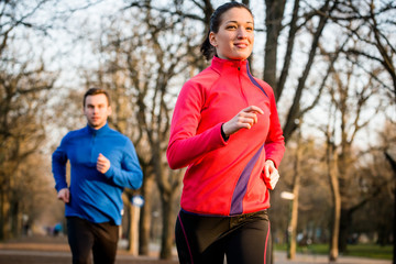 Wall Mural - Couple jogging together