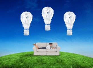 Aufkleber - Composite image of business woman lying on couch