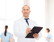 © Syda Productions - smiling male doctor with clipboard