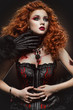Gothic redhaired beauty and the beast