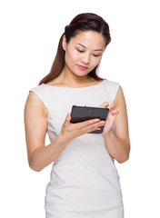 Wall Mural - Asian businesswoman use tablet