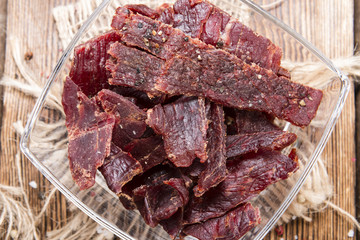 Canvas Print - Beef Jerky on wooden background