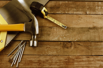 Wall Mural - Carpentry tools on wood. Copy space