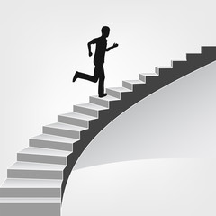 Wall Mural - man running up on spiral staircase