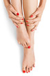 © juniart - Woman with beautiful red finger and toenails