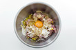 Minced meat,corns, eggs and flour in stainless steel bowl