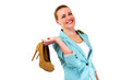 © Wisiel - woman smiling holding shoes over white background