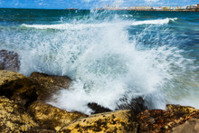 Waves Splashing Rocks