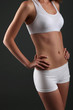 © Africa Studio - Beautiful woman with slim body on gray background