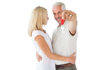 Wall Mural - Happy couple showing their new house key