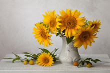 Bouquet  Of Sunflowers In Old Ceramic Jug