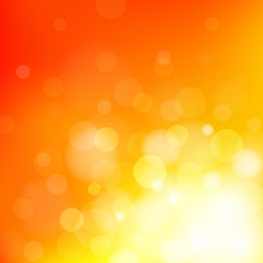 Wall Mural - summer orange background with bokeh and lens flare pattern