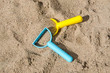 Toys in a sandbox closeup