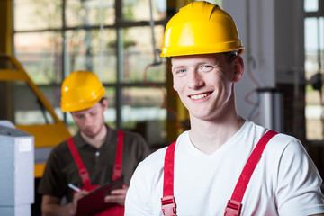 Men during work at factory