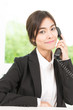 © siraphol - Business woman talking cellphone