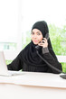 © siraphol - Arab business woman working