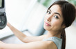 © siraphol - Woman workout at fitness