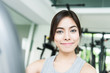 © siraphol - Woman workout at fitness
