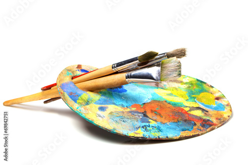 Fotografie, Obraz Art palette with paint and a brush on white background
