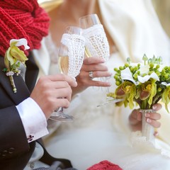 Wall Mural - Bride and groom holding champagne glasses