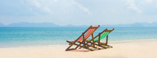Bright Color Wooden Beach Chairs On Island Tropical Beach