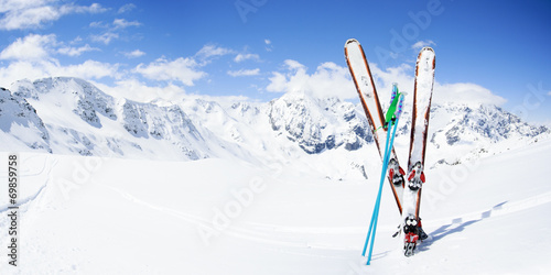 Fotomural Skiing , mountains and ski equipments on ski run