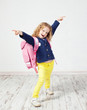 Little girl with schoolbag