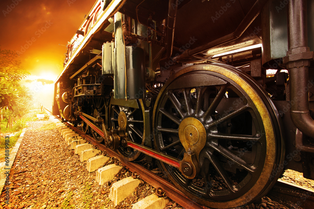 iron wheels of stream engine locomotive train on railways track - obrazy, fototapety, plakaty 