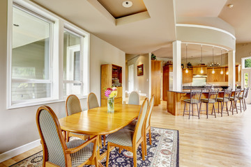 Kitchen interior witn dining area in luxury house. Real estate i