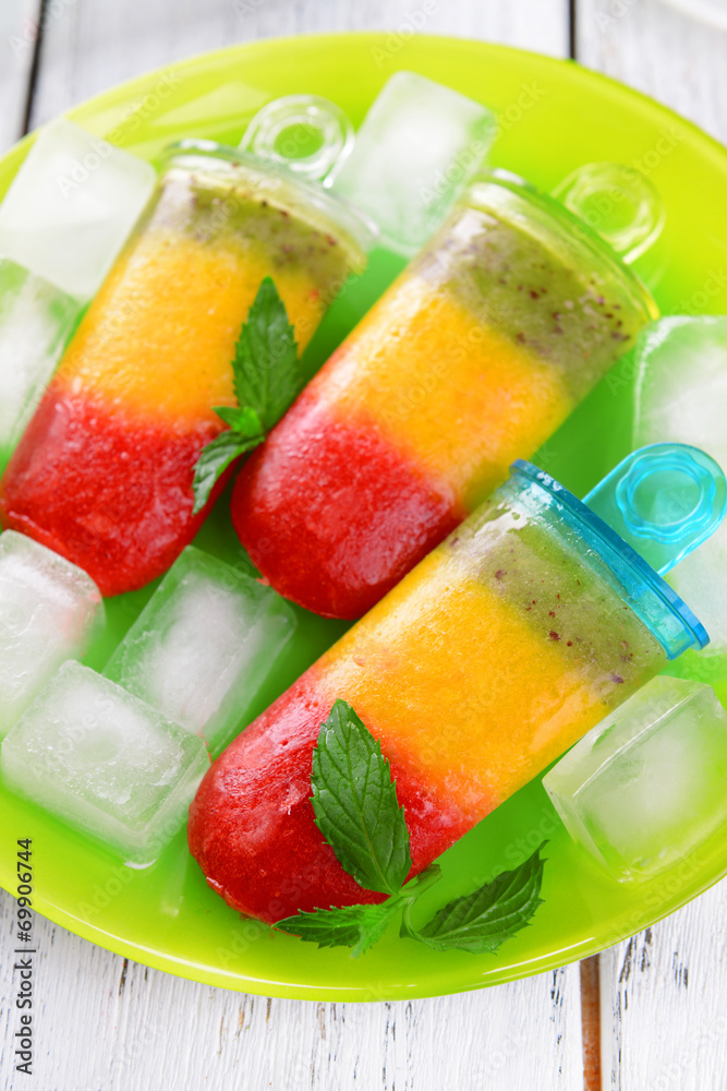 Delicious ice cream on plate on table close-up