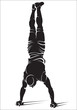 Sporty man doing street workout exercise. Handstand