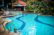 © emaria - Activities on pool, boy swimming and playing in water. Koh Samui