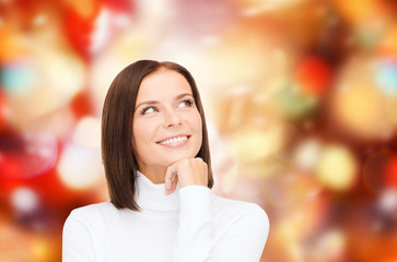 Sticker - thinking and smiling woman in white sweater