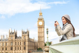 Fototapeta Big Ben - Travel tourist in london sightseeing taking photos