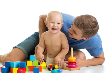 Wall Mural - kid boy and father playing together